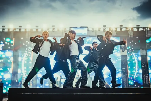 The Shillong Cherry Blossom Festival concert stage showing a boy band performing at a music festival in India