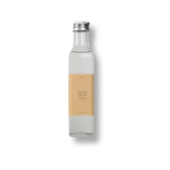 a bottle containing the best body oil derived from pure coconut milk oil