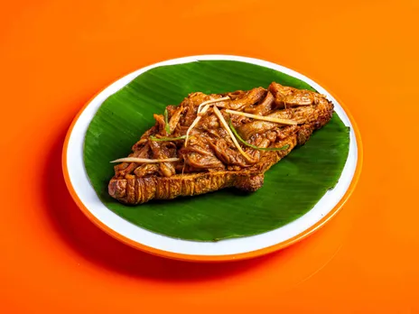 A picture of Nihari Prashant, a nihari croissant at Social, which depicts how nostalgia in India ties to nostalgia and identity in India through food
