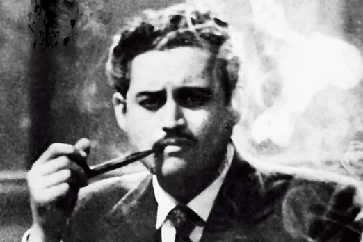 Guru Dutt smoking pipe with smoke in 