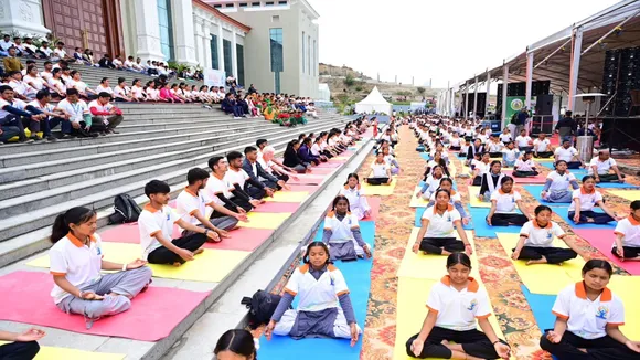 Children performing Yoga
