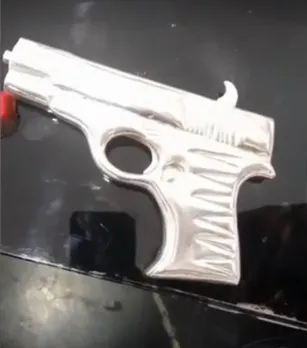 Silver Gun Offered at Sanwaliya Seth Temple