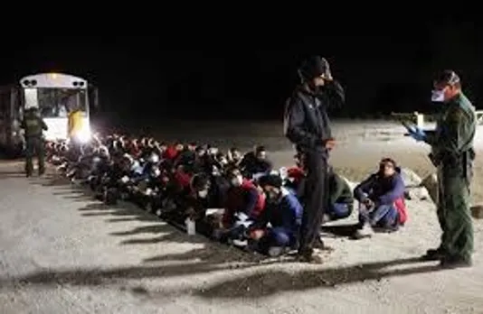 us-deportation-indian-citizens-handcuffed-back