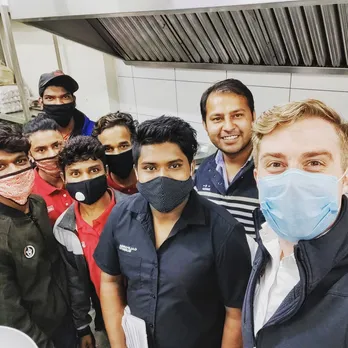 Bert with his employees