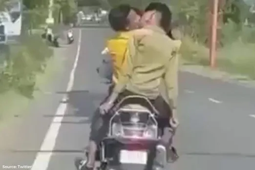 Viral video: 2 boys seen kissing on moving scooter in UP