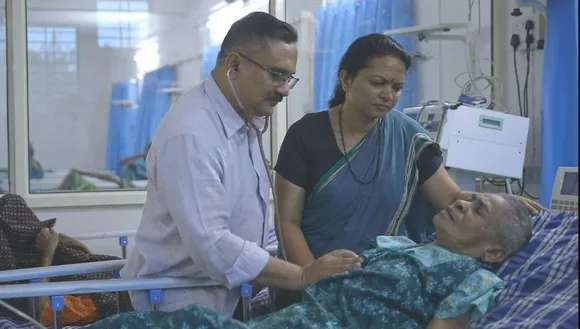 Doctor Couple working for old age women wandering on street