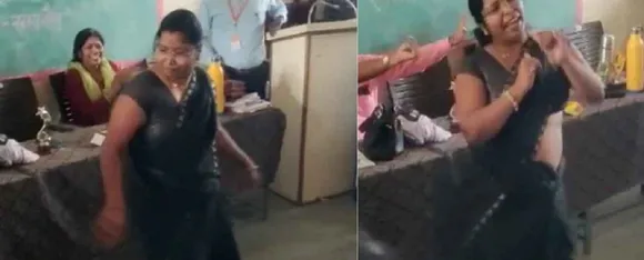 Teacher Dancing In A Classroom