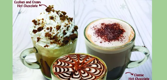 Barista Brings Christmas Delights: Plum Cake & Varieties of Hot Chocolate Beverages