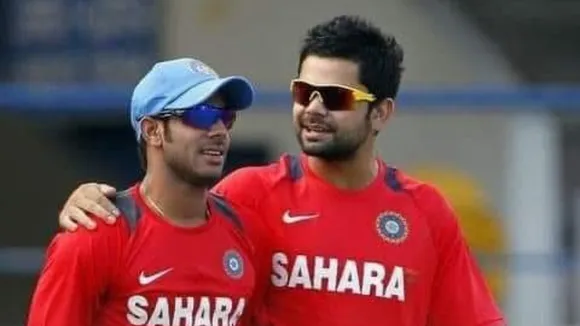 Manoj Tiwary and Virat Kohli