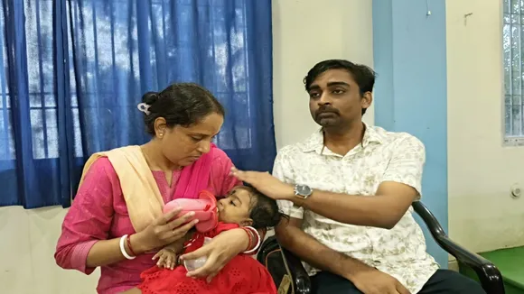 Malda 9-month-old baby rare disease  ,Anshika Mandal SMA patient  ,Spinal Muscular Atrophy treatment India,  9 crore injection for baby  ,Expensive injection rare disease , Child needs Zolgensma injection,  Professor appeals to PM Modi Mamata Banerjee,  Rare disease fundraising India,  Malda baby treatment crisis,  Save Anshika campaign,মালদা ৯ মাসের শিশু,  অংশিকা মণ্ডল বিরল রোগ,  স্পাইনাল মাসকুলার অ্যাট্রোফি,  ৯ কোটি টাকার ইনজেকশন,  বিরল রোগের চিকিৎসা ভারত  ,শিশুর জন্য ব্যয়বহুল ওষুধ  ,প্রধানমন্ত্রী ও মুখ্যমন্ত্রীর কাছে আবেদন,  বিরল রোগ চিকিৎসার খরচ  ,অংশিকাকে বাঁচাও প্রচার  ,মালদা শিশুর চিকিৎসা সংকট