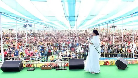 Mamata Banerjee, Cooch Behar rally, Ras Mela ground, Trinamool Congress, BJP attack, 100 days work dues, pending funds, Rs 51,617 crore, Rajbanshi community, Panchanan Barma, Lakshmi Bhandar scheme, Karmashree scheme, SIR issue, NRC controversy, Bengal vs BJP politics, West Bengal Election 2026, Centre-state conflict, Modi Bankim remark, Bengal icons insult, political rally speech