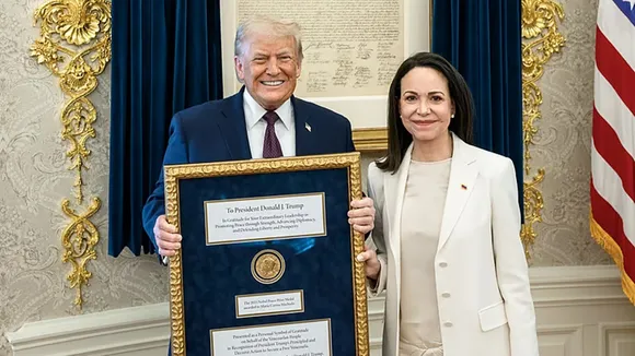 Donald Trump Nobel medal, Maria Corina Machado Nobel Peace Prize, Trump White House meeting Machado, Nobel Peace Prize controversy, Nobel medal symbolic gesture, Venezuela opposition leader Machado, Trump Venezuela politics, Nobel Institute rules, Trump Truth Social statement, international politics news in Bengali