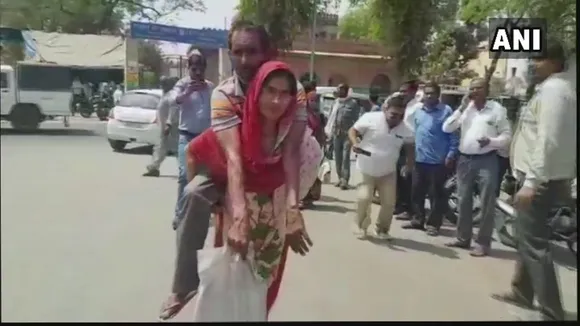woman, wife, handicapped husband, mathura, civic apathy