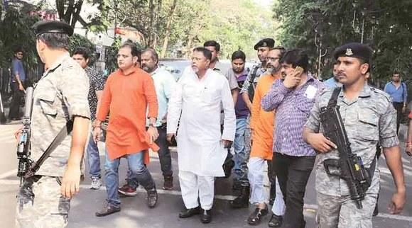 Mukul Roy leads a rally in front of the State Election Commission office in Kolkata on Wednesday.