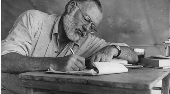 Hemingway_Writing_at_Campsite_in_Kenya