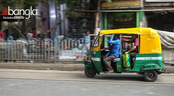 kolkata Auto Driver carrying extra passengers his beside Express Photo Shashi