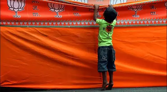 a kid with bjp flag