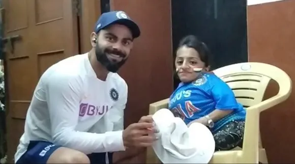 Virat Kohli with his fan