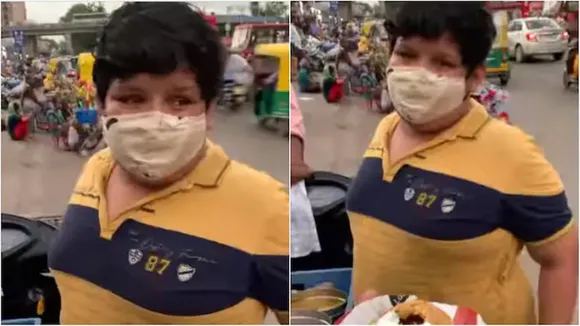 Boy selling kachori