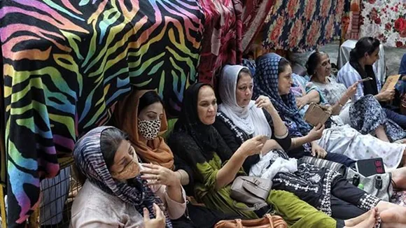 Government seeks time to deal with Afghan protesters outside UNHCR