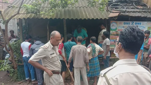 A monkey trapped by forest workers at kolaghat