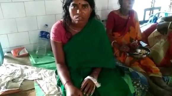 Woman came at malda medical college by capturing snake, quickly treatment have save her life
