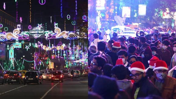 Overflowing Christmas Crowd at kolkatas Park Street Victoria StPauls Cathedral Alipore Zoo Eco Park
