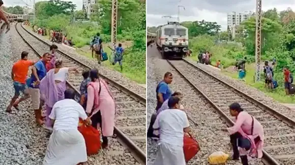 Railway,IAS Awanish Sharan,viral video,woman crossing rail track,train