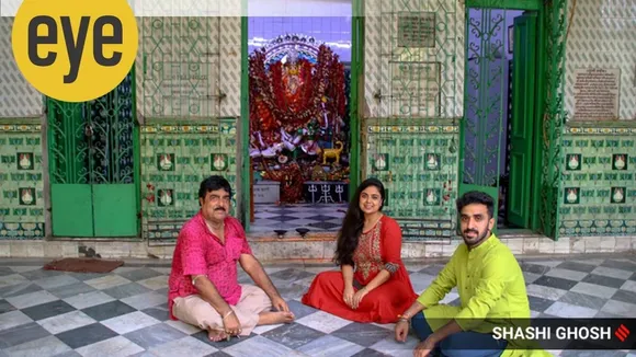 Kashiswar Roy Chowdhuri with daughter Rituparna and son Chandraroop at Chitteswari Durga temple.
