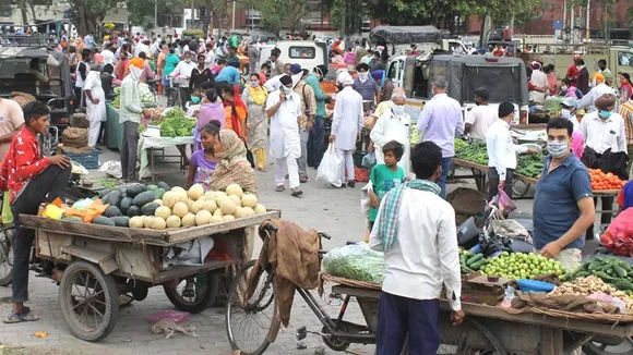 People buying vegetables