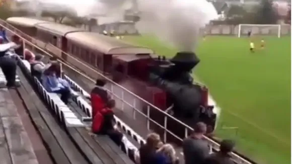 Cierny Hron Railway, Ciernohronska Zeleznica, narrow gauge railway in the Slovak, forest railway, soccer stadium,, TJ Tatran Cierny Balog club, railway Line pass through the middle of a soccer stadium,