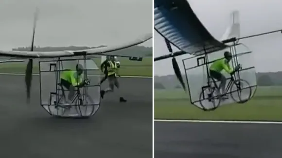 flying bicycle video, flying bicycle, man fly a bicycle like a plane, viral video of man fly a bicycle like a plane, Amazing video, viral video,