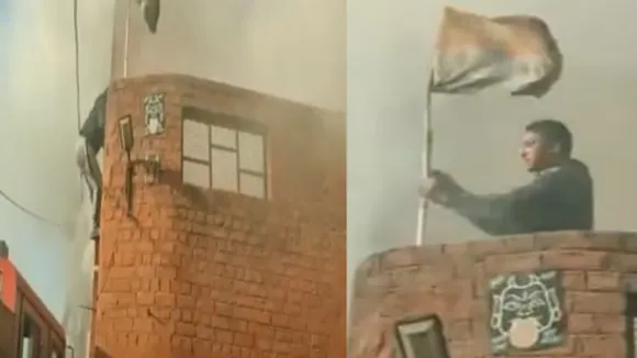 man save tricolor from fire, viral video man save tricolor from fire, Amazing video, viral video, viral news