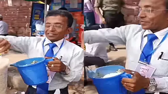 jhalmuri seller wear shirt tie, man make bhel looks like gustavo fring, breaking bad gustavo fring, jhalmuri shirt tie man, bhel selling man wear shirt tie video, roadside vendor wear shirt tie video, ajab gajab news, viral news, world news, omg news, amazing news, trending news, hatke khabar, khabren zara hatke, weird news, ajeebogareeb khabar, omg khabar, hatke news