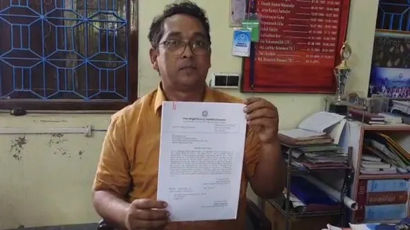 Even though he was present at school on the day of strike a showcause letter came to tmc office against teacher , ধর্মঘটেও ছিলেন স্কুলে, তবুও শিক্ষকের বিরুদ্ধে শোকজ চিঠি তৃণমূল দফতরে!