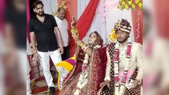 up bride, bride fires gunshots, bride fires gun, trending video, viral video