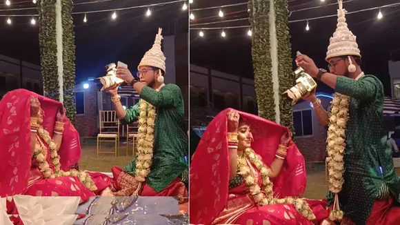 Wedding News, bride groom video, groom clicking photo, photographer groom, trending news, dulha photography, groom capturing photo of bride, bride photo,"