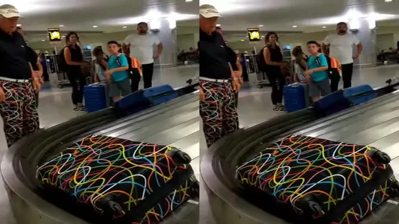 trending Video, viral video, Funny Video, Viral Jugaad Video, Trending Jugaad Video, Funny Video, Funny Video, Funny Reel, Funny Airport Video, Viral Video of Airport, Traveller Wearing Pants and Suitcase Same Design, Social Media, Offbeat,