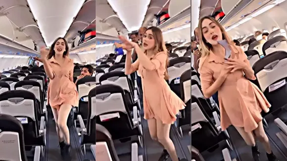 girl dances on flight, vivah song, girl dances to hamari shaadi mein, shahid kapoor vivah song"