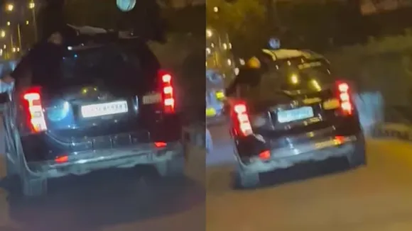 dead man on car roof, video of dead man on car roof, delhi man lying dead on car roof, delhi hit and run case, delhi road accident, delhi news