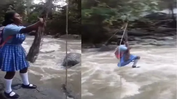 Girls risk their lives to go to school, bina pul ke paar ki nadi, viral video of girl crossing river, Shocking video, viral videos, trending videos, trending news hindi, Trending Latest News, odd news, viral On Internet, Weird news, strange news,