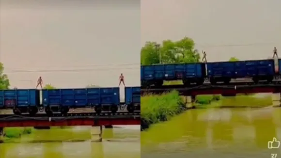 goods train,train stunt,risky stunt,youth stunt,viral video
