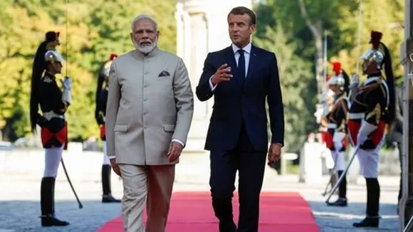 Narendra Modi, Narendra Modi Paris visit, Emmanuel Macron modi meet, Modi Bastille Day Parade, Bastille Day Parade, india france relations, modi in france, modi in paris, modi macron, Bastille Day Parade paris, Bastille Day Parade modi,indian express