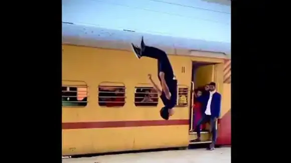 Man,cartwheel,railway station,Twitter,video,viral