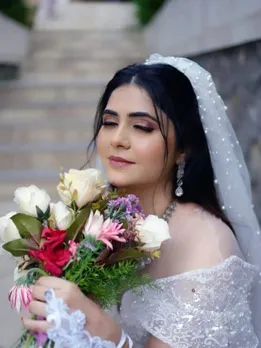 cropped-Veena-Jagtap-White-Gown.jpg