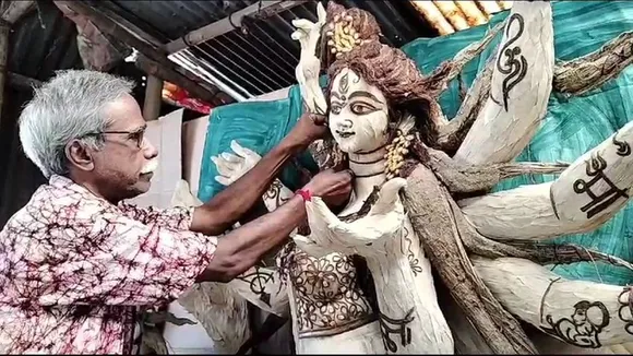 bishnu chandra saha of malda making durga idols using corn husks straw rice husks wheat husks
