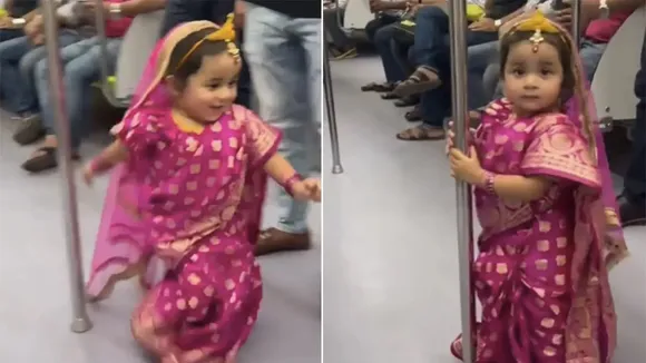 durga ma in kolkata metro,chhoti durga,little girl seen in metro wearing a saree,Metro Viral Video,metro viral video twitter,metro viral video clip,metro viral video original,Little girl,Kolkata Metro,Kolkata Metro News,Metro,durga maa,durga maa navratri sawari,durga maa photo,durga maa image,durga maa favorite color,Durga Maa Aarti,durga maa pic