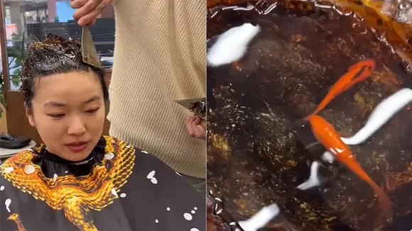 woman set aquarium on head