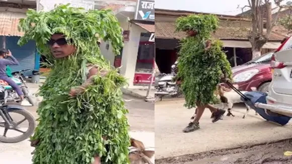 man wear leaves, man wear leaves clothes, patti se bane kapade, urfi javed brother, man walk on road with leaves, man cover himself with leaves on road, leaves clothes video, man wearing leaves viral video, ajab gajab news , viral news , omg news , amazing news , shocking news , trending news