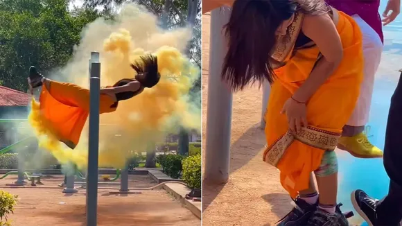 woman doing stunt in saari,woman stunt in saari,Holi stunt video,holi stunt goes viral,colour pop up stunt,viral video,trending video,viral video on social media,OMG,Amazing News,woman stunt,woman stunt viral video,woman stunt dance video,